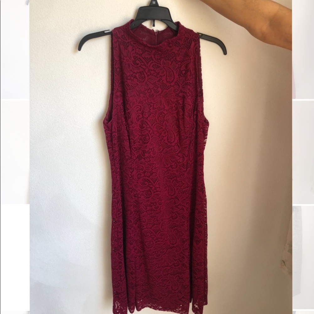 High-collared maroon lace dress